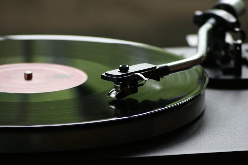 Close-up of spinning record player.